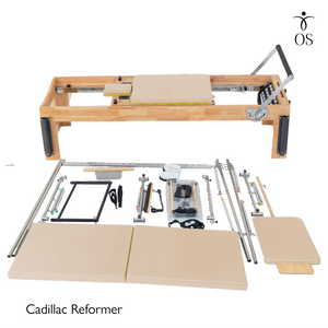 Pilates Cadillac Reformer with components on a white background