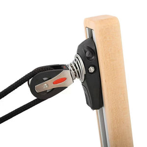 Rope pulley mechanism mounted on the Maple upright of the Oshun Studios Timber Reformer for smooth resistance