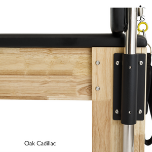 Close-up of the heavy-duty black mounting bracket connecting the stainless steel tower to the solid Oak frame of the Timber Cadillac.