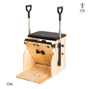 The Timber Chair by Oshun Studios in solid Oak. A modern split-pedal Wunda chair designed for home and studio Pilates.