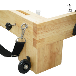 Front view showing the built-in transport wheels on the solid oak legs for easy studio mobility.