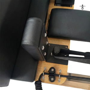 High-density foam carriage with premium black vinyl upholstery, designed for heavy commercial use and comfort.
