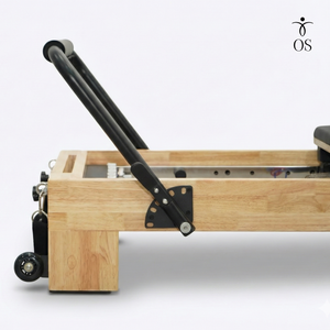 Close-up of the rapid adjustment footbar mechanism with multiple locking positions, ensuring safety and quick transitions for Pilates classes.