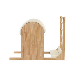 The Timber Ladder Barrel by Oshun Studios in solid Oak. A luxury Pilates barrel designed for spine extension and flexibility exercises.