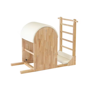 The Timber Ladder Barrel by Oshun Studios in solid Oak. A luxury Pilates barrel designed for spine extension and flexibility exercises.