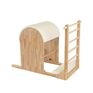 The Timber Ladder Barrel by Oshun Studios in solid Oak. A luxury Pilates barrel designed for spine extension and flexibility exercises.