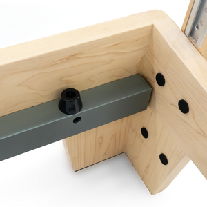 Maple frame corner joinery with steel rail insert on the handcrafted Oshun Studios Timber Reformer