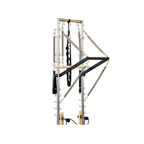 Pilates reformer machine with tower edition label on a white background