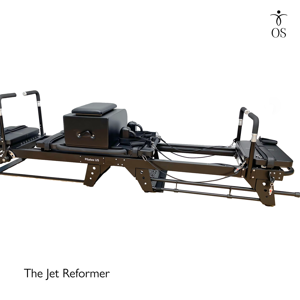 Industrial steel monorail track on the Jet Reformer ensuring a silent, friction-free glide under heavy resistance.