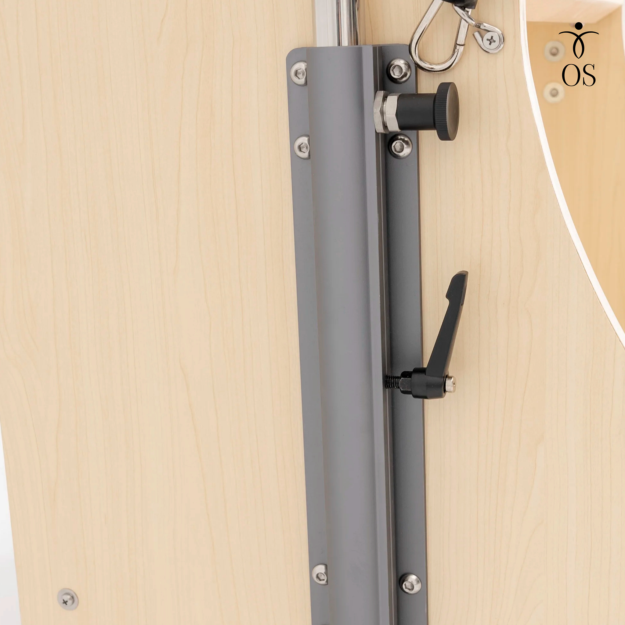 Close-up of the secure locking lever and height adjustment track for the handles on the Maple Timber Chair.