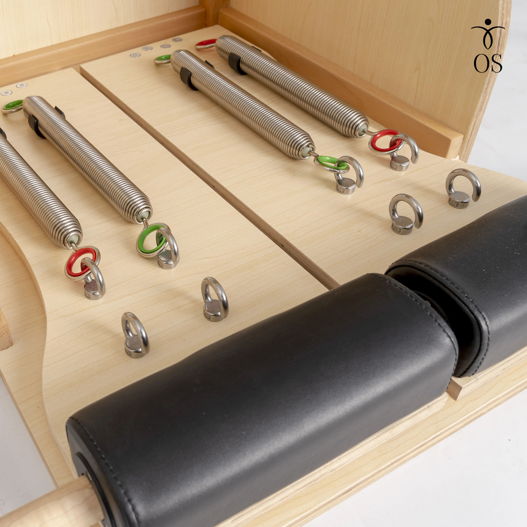 Back view of the Maple Timber Chair highlighting the spring attachment points and natural light wood grain.