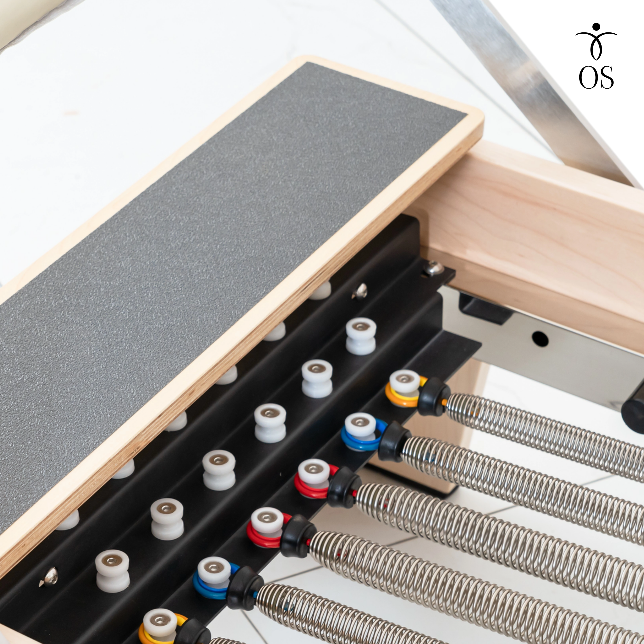 Close-up of the springs on the Maple Timber Reformer frame.