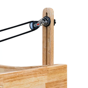Detail view of the riser attachment on the Oak Timber Reformer, designed for optimal rope angle and stability.