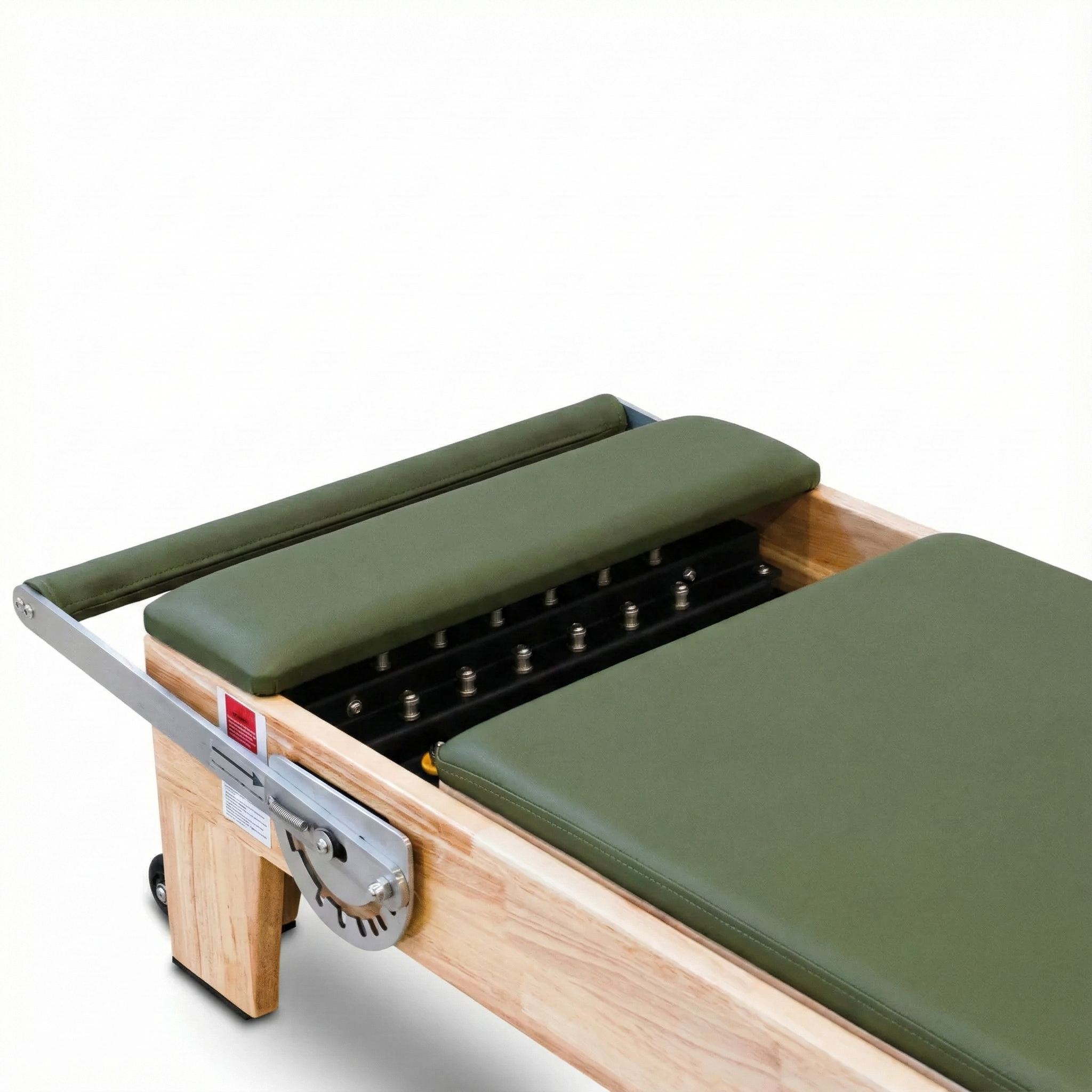 High-density padded carriage platform on the Oak Timber Reformer, featuring custom upholstery and solid Oak trim for comfort and stability.