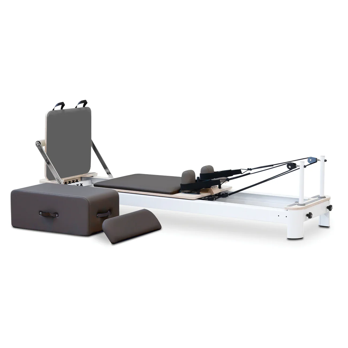Oshun Origin Reformer with white frame and espresso brown upholstery, sitting box and jump board