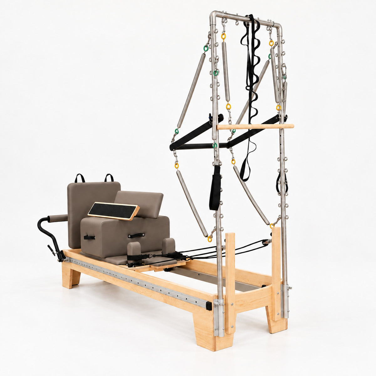 Oshun Timber Therapy Reformer Tower Edition in maple with taupe upholstery, sitting box and jump board