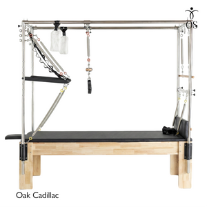 The Timber Cadillac by Oshun Studios in solid Oak. A full studio Trapeze Table featuring a stainless steel canopy and premium upholstery.